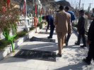 مزار مطهر شهدای زاهدان با حضور مدرسان و کارکنان دانشگاه جامع علمی کاربردی استان غبارروبی و عطرافشانی شد